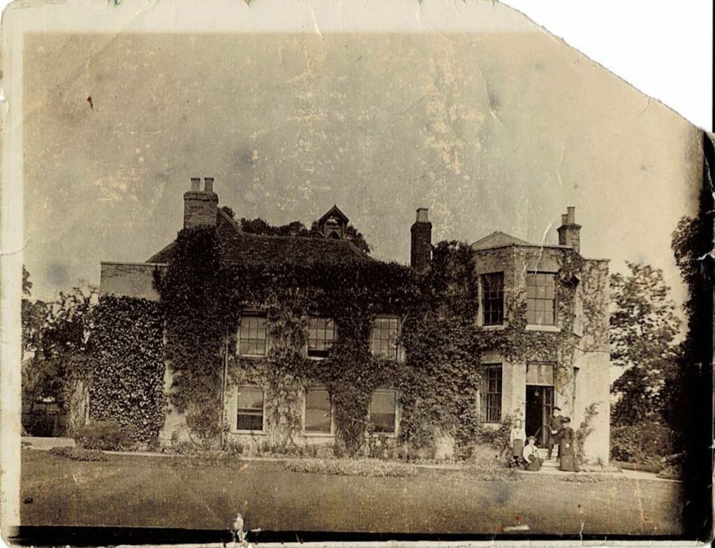 The Rectory at Stapleford Tawney, with the Revd. Prance and family