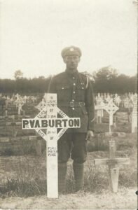 The picture on the left shows the temporary grave marker. These temporary markers (few of which survived) were eventually replaced by the stone gravestones by the Commonwealth War Graves Commission.
21 |
