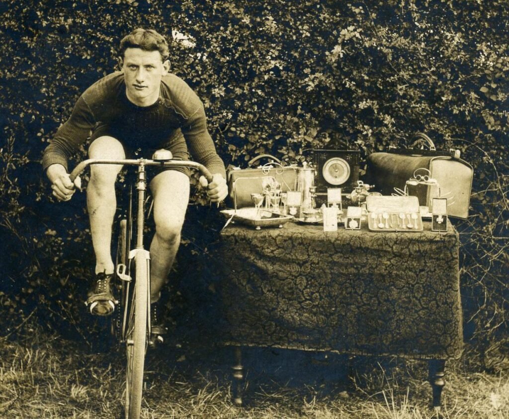 Bert with some of his medals and trophies