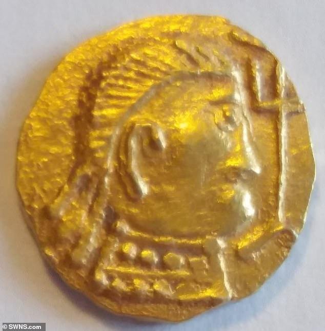 The coin is an early Anglo-Saxon coin depicting a right facing crowned individual holding a trident.