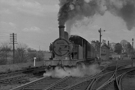 F5 2-4-2T 67200 leaving Ongar 28.04.1956