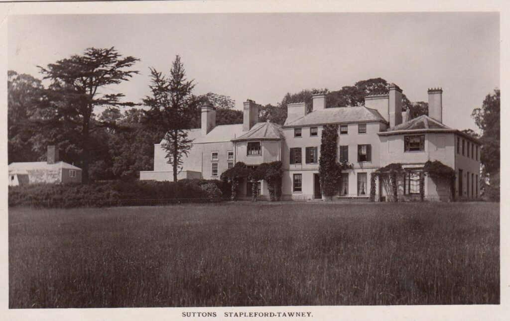 Rear view of Suttons Manor, before the wing on the right was demolished. The oldest surviving part is the crosswing in the centre of the photo.