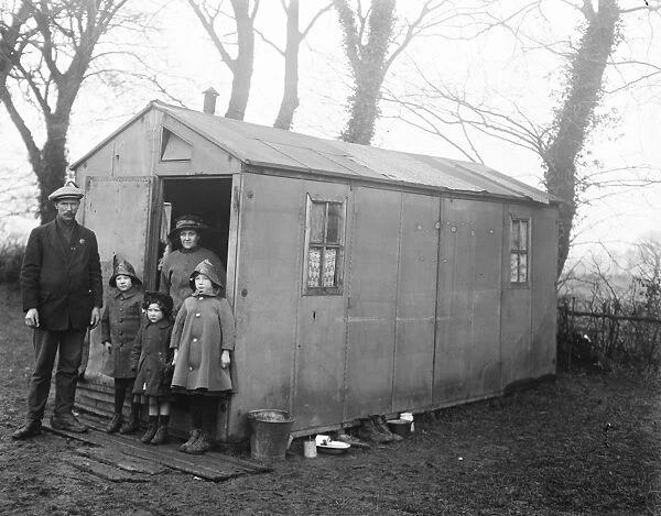 The photograph was taken on January 28, 1920, outside their canvas hut at Greensted.